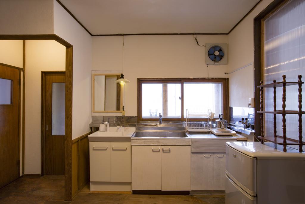 Guest House Sato Shoten Toyoura Exterior photo